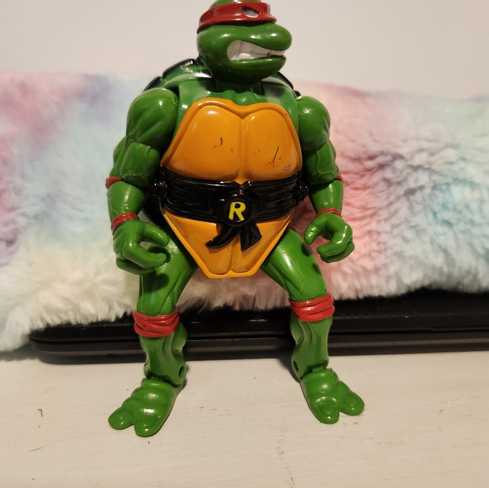 Vintage TMNT Raphel transforming figure.